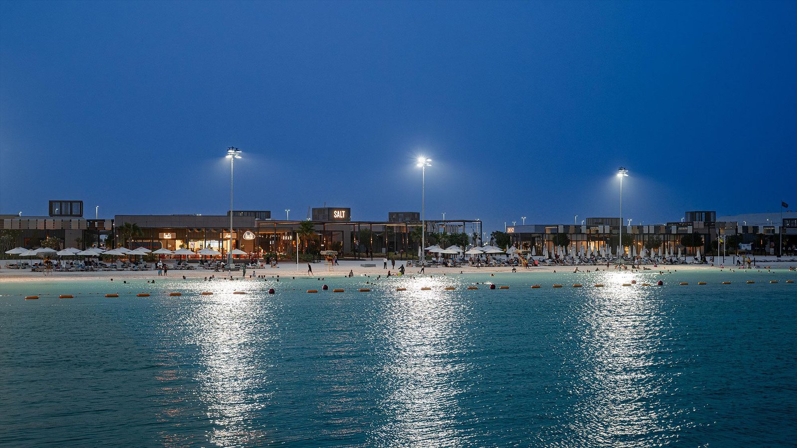 Scenic view of the vibrant marina and promenade at Marsana.